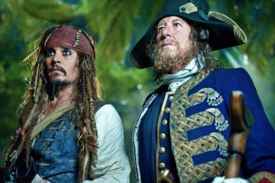 Johnny Depp and Geoffrey Rush in PIRATES OF THE CARIBBEAN: ON STRANGER TIDES